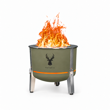 Alpha 600 fire pit in Forest Haze with stainless steel legs; fire pit only, without optional grilling accessories.
